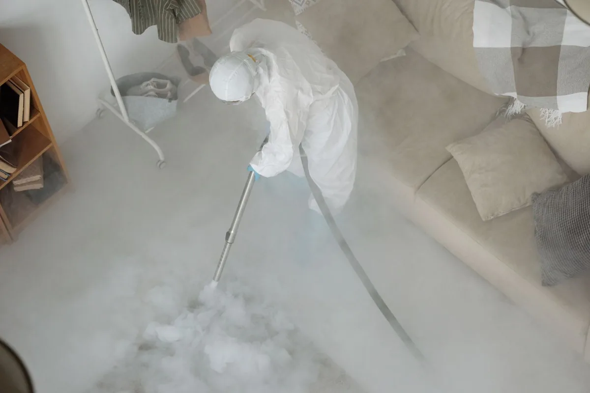 Biohazard cleanup technician in protective equipment, Edmonton, KY